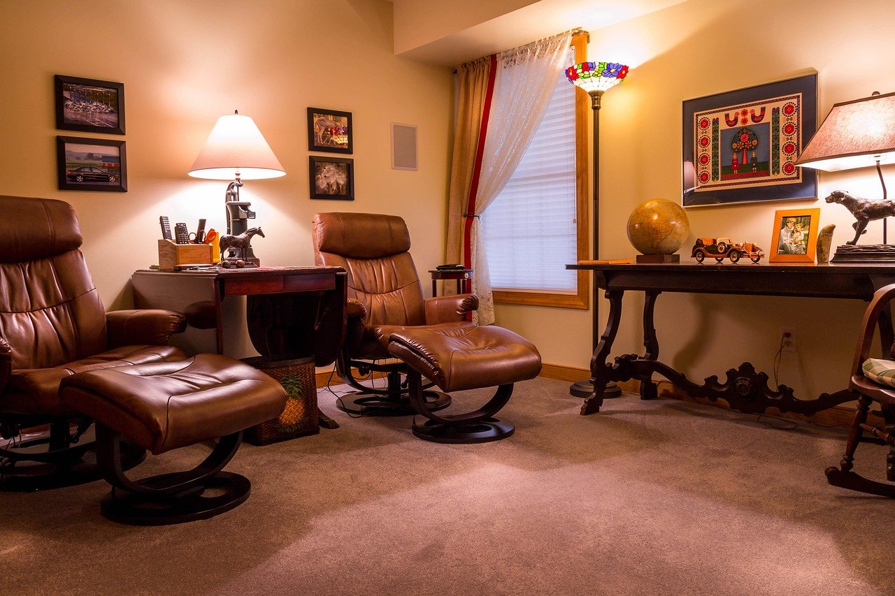 Home theatre room with comfortable seating and ambient lighting