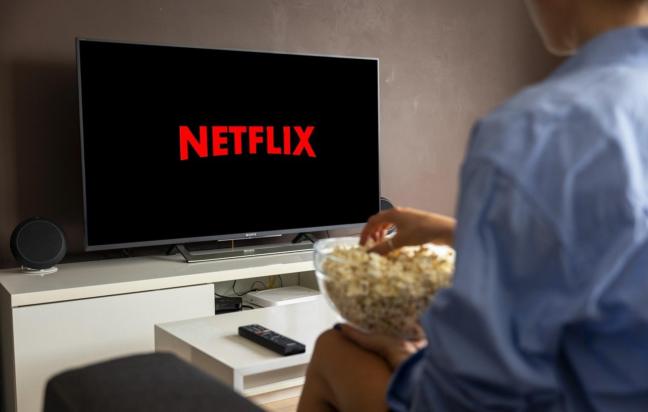 Person watching streaming content on a smart TV